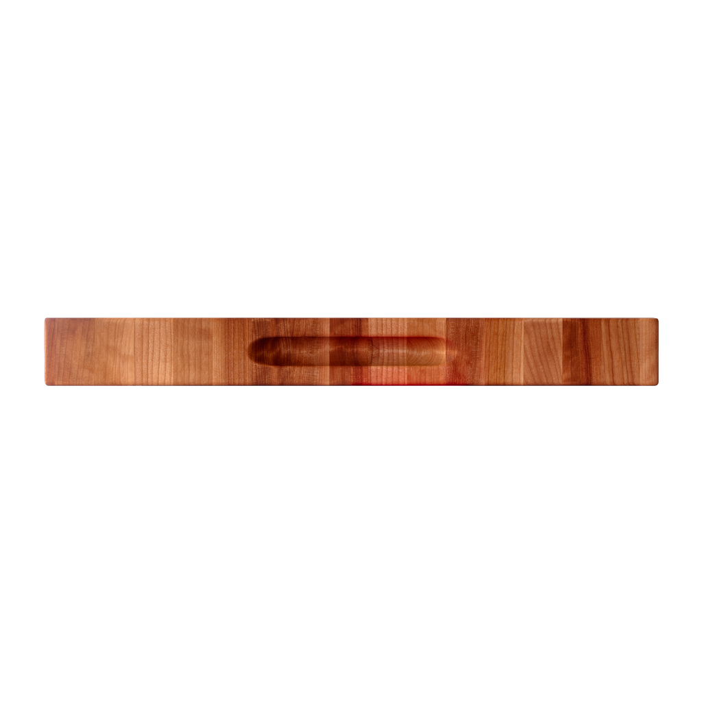 Side view showing the hand grip of the maple and birch end-grain butcher block, 18 × 16 in