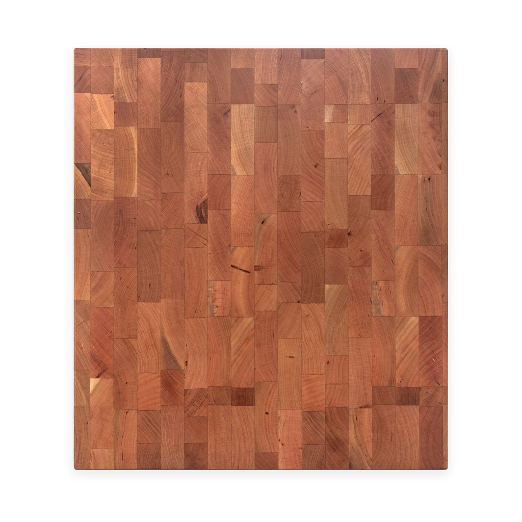 Overhead view of the cherry end-grain butcher block, 18 × 16 in