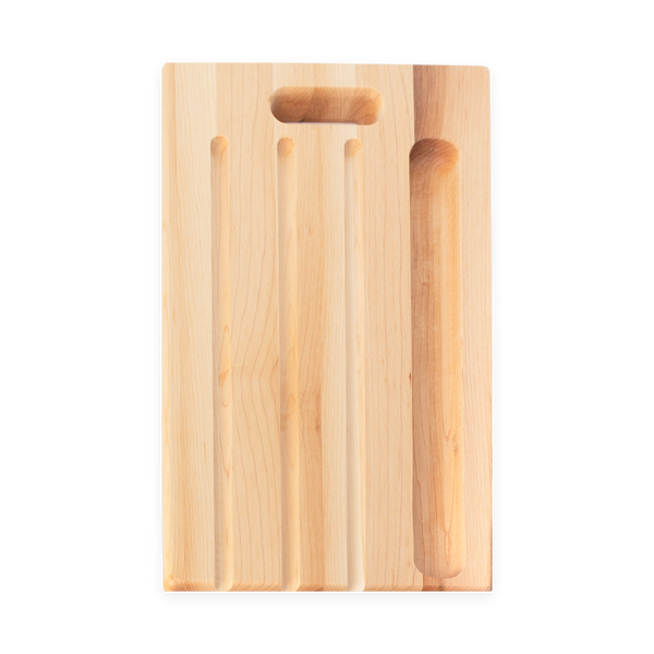 Overhead view of the 16 × 10 inch wooden bread board with grooves and knife compartment