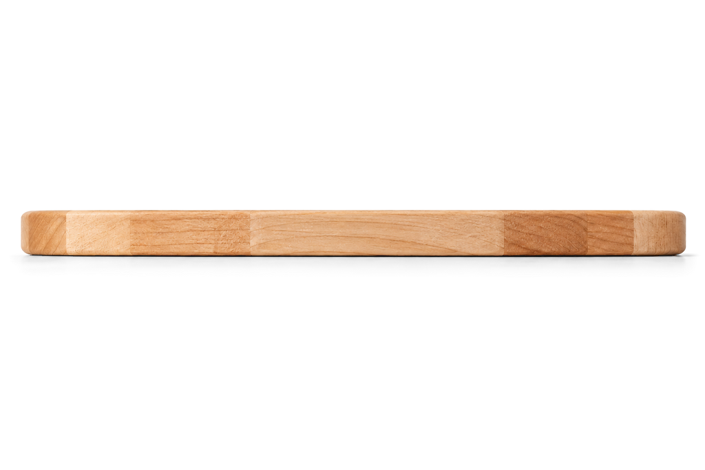 Side view of a round maple steak board, 11-inch size and 0.75 inch thick