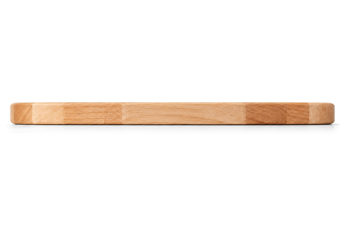 Side view of a round maple steak board, 11-inch size and 0.75 inch thick