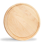 Round maple steak board standing upright, viewed at an angle