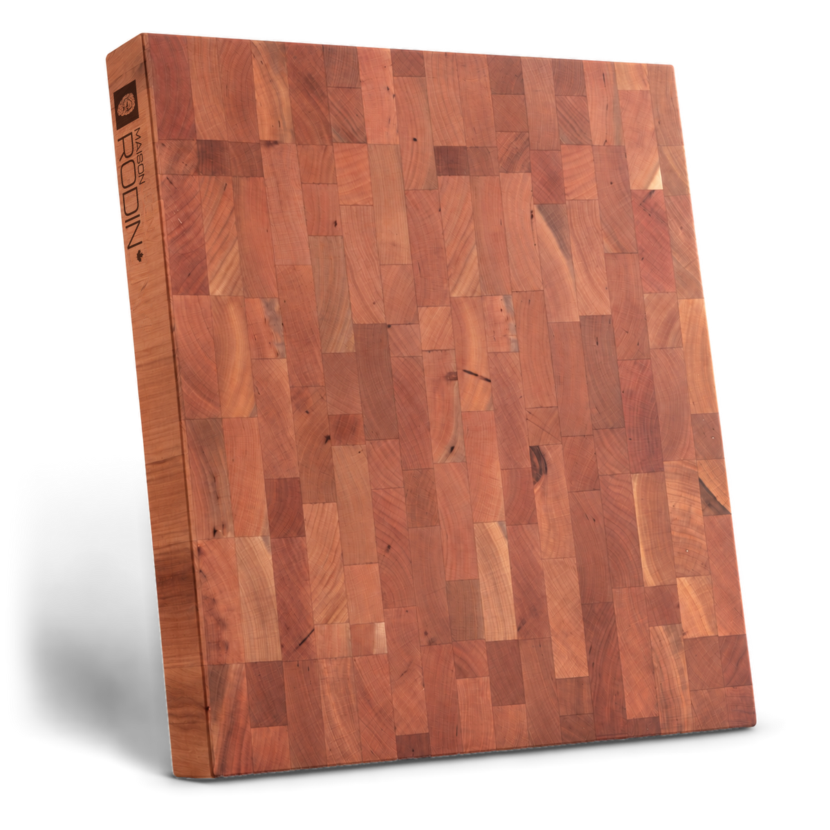 Bloc de boucher en bois de bout de cerisier, de 18 × 16 × 1,75 pouces, posé debout sur son petit côté, avec la marque et la prise de main visibles.