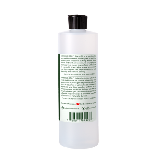 Back of the MAISON RODIN Care Oil bottle with bilingual directions and barcode