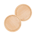 Two 11-inch round maple steak boards with juice grooves, overhead view.